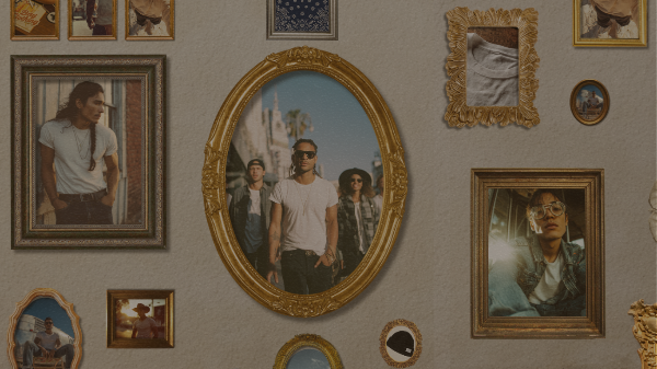 Artistic gallery wall featuring framed portraits of men wearing white T-shirts styled in vintage fashion, part of Bay Clothing’s heritage collection